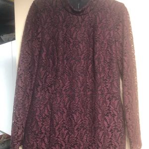 Lace designer dress, fully lined except for sleeves.  Fits like a size 8.